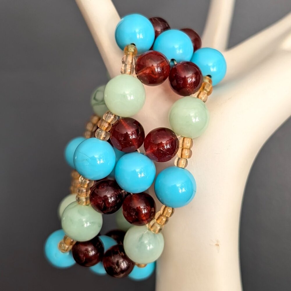 Blue, amber, green and pale yellow beaded stretch bracelet